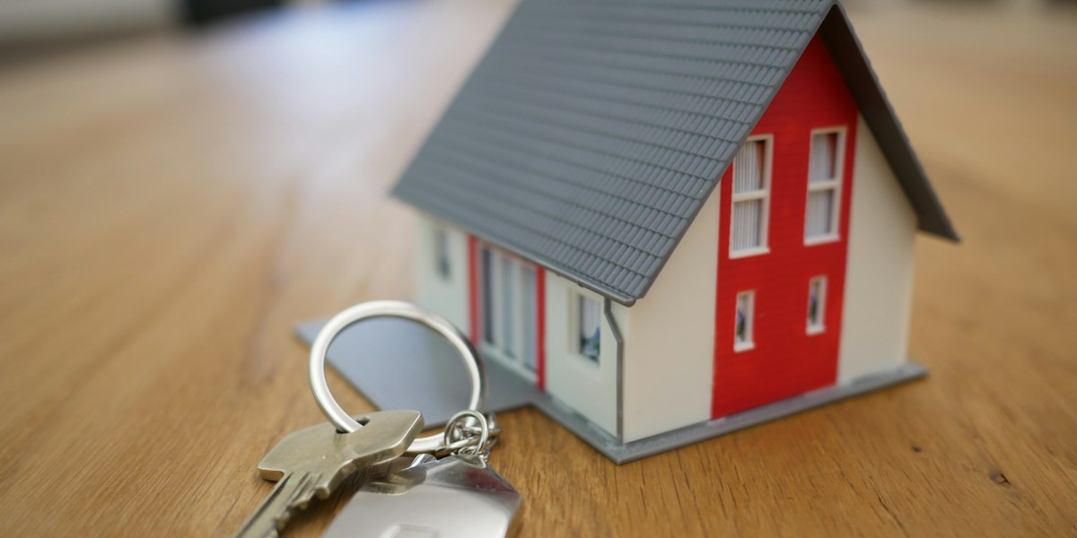 Model house with a set of keys